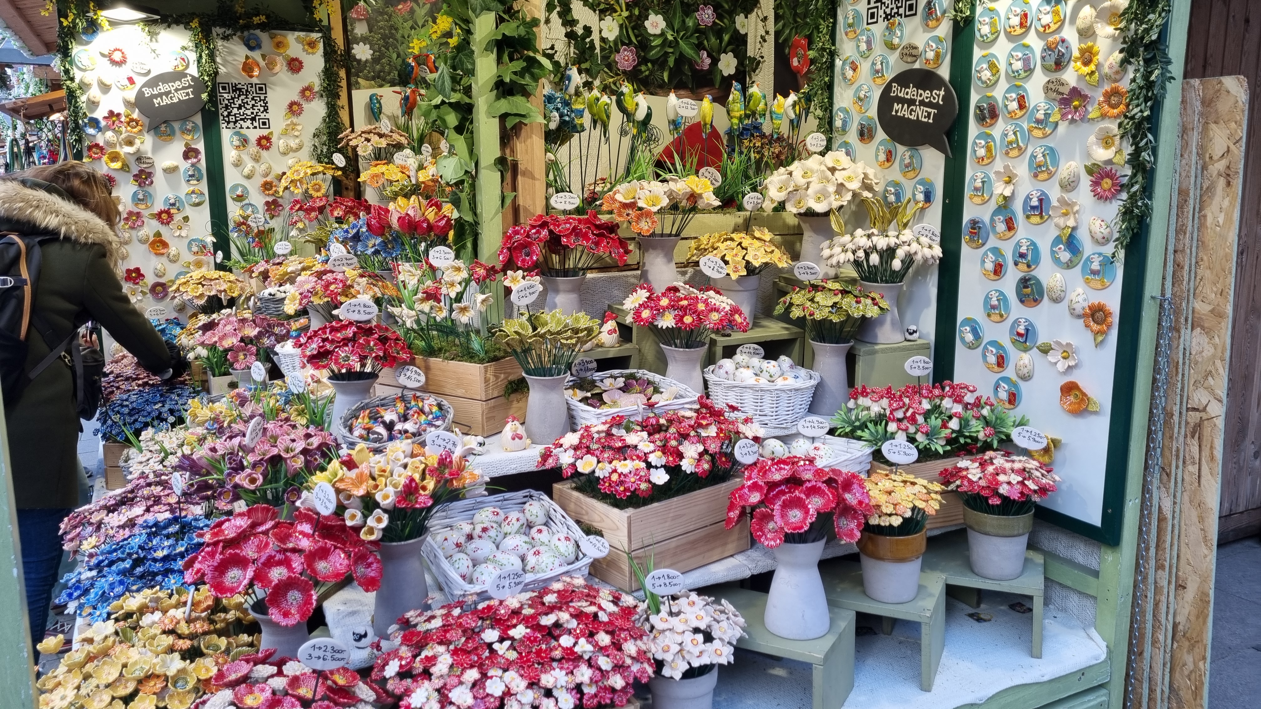 ceramic flowers at a market stall