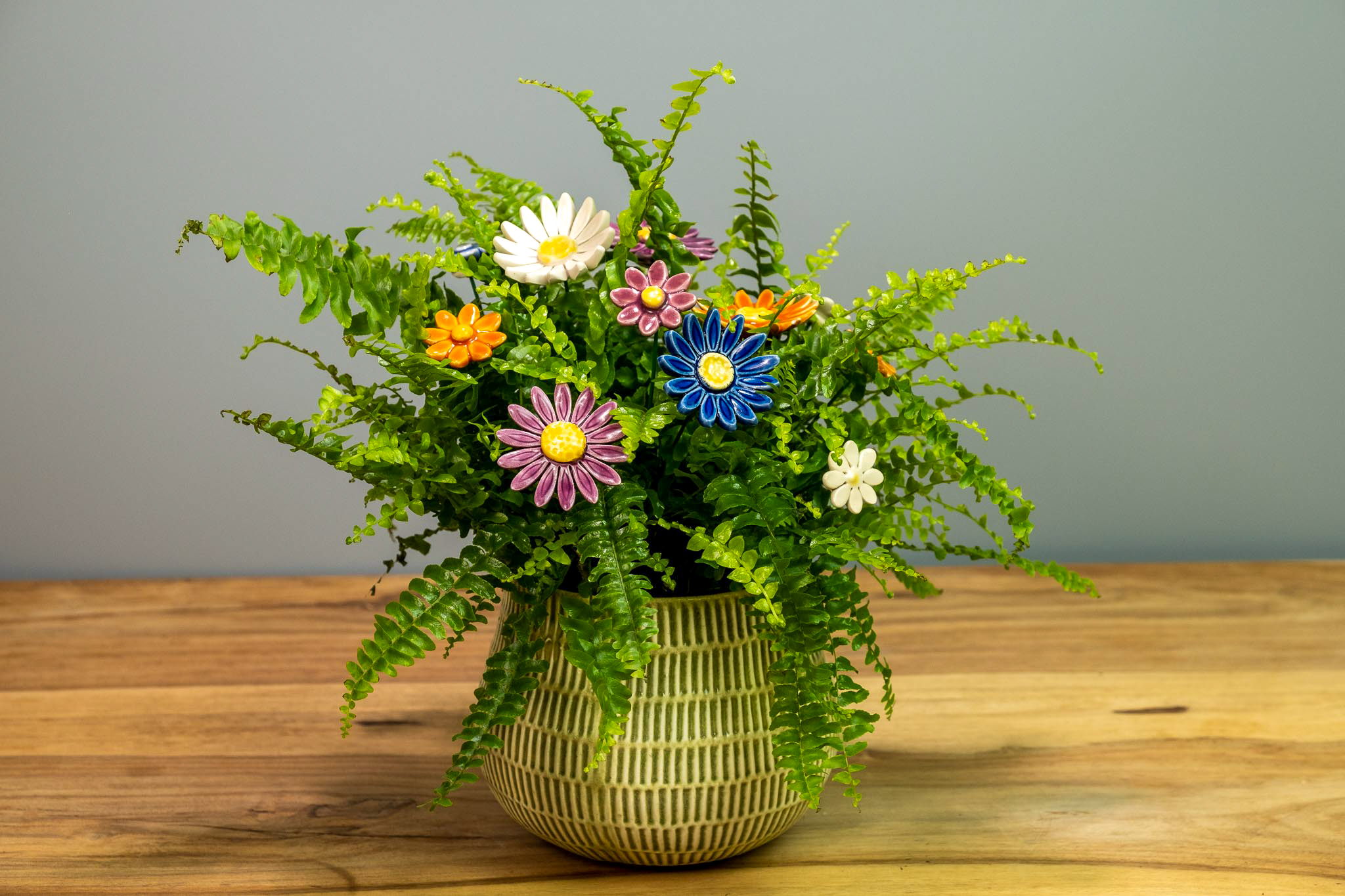 ceramic flowers in a home plant